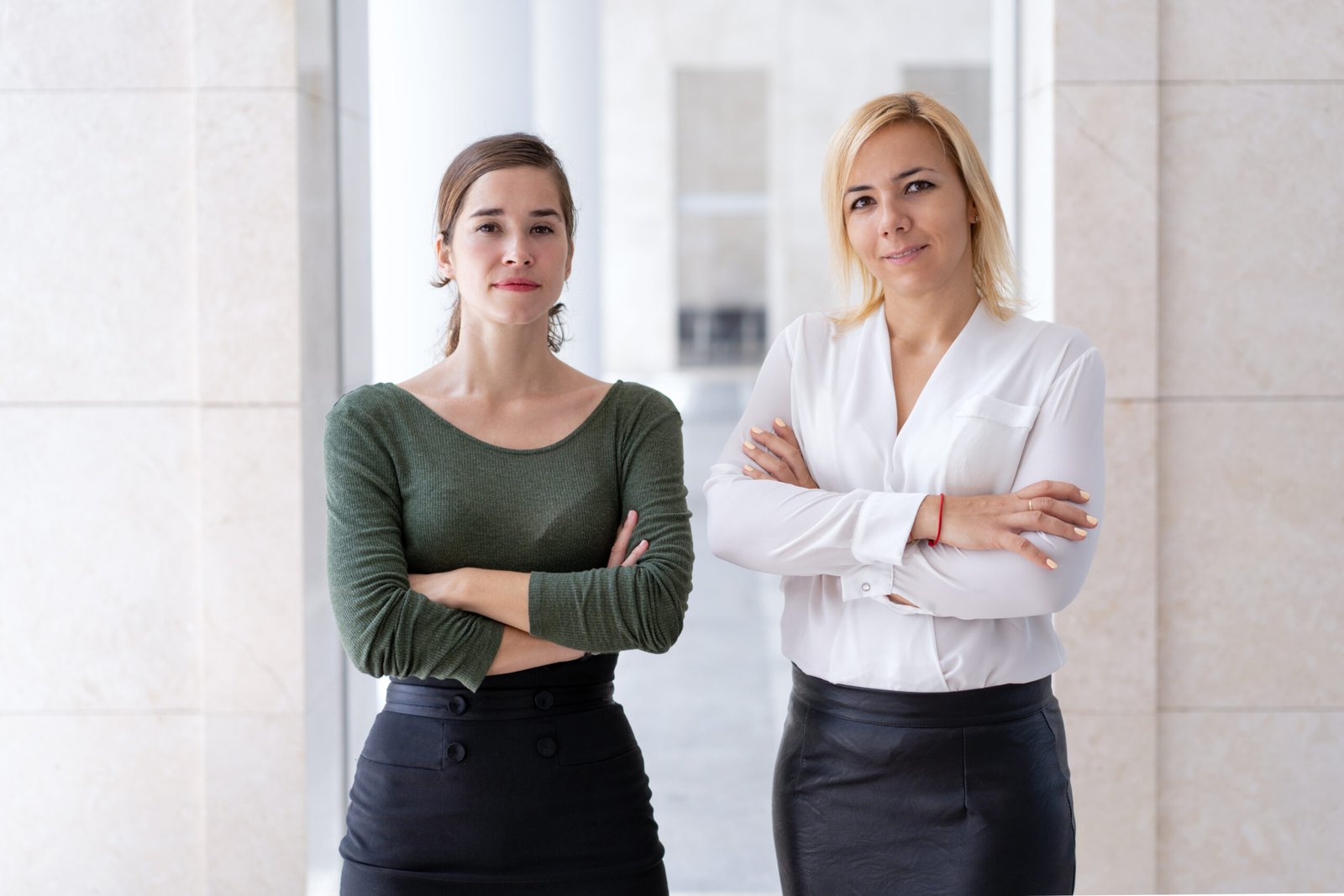 Business team of two young female professionals